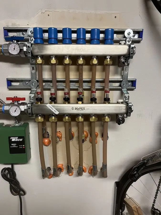 Plumber performing Leak Detection at a residential property in Brookridge